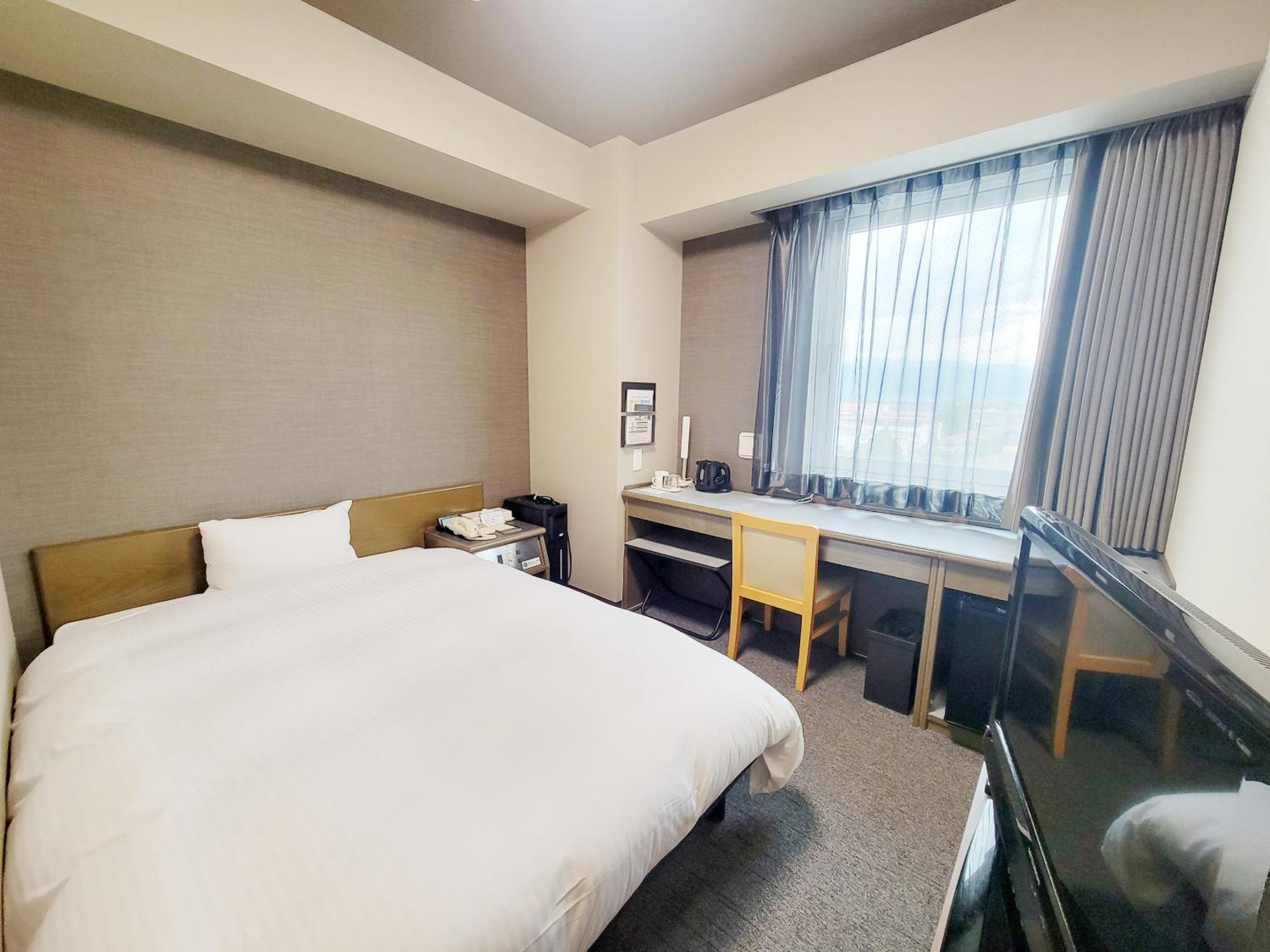 Hotel Route-Inn Court Chikuma-Koshoku Kültér fotó